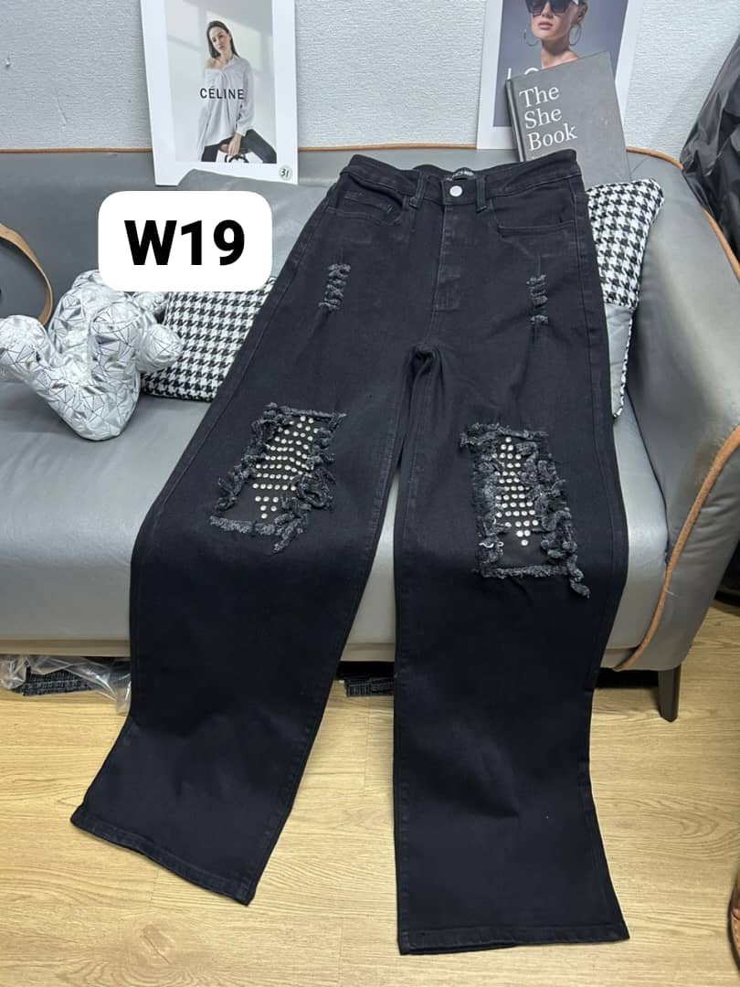 Black distressed studded leg jean